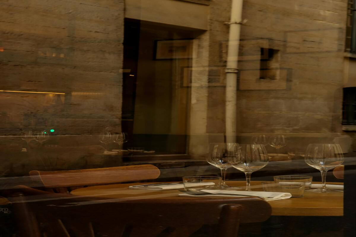 Paris, couple having romantic dinner at parisian Bistro