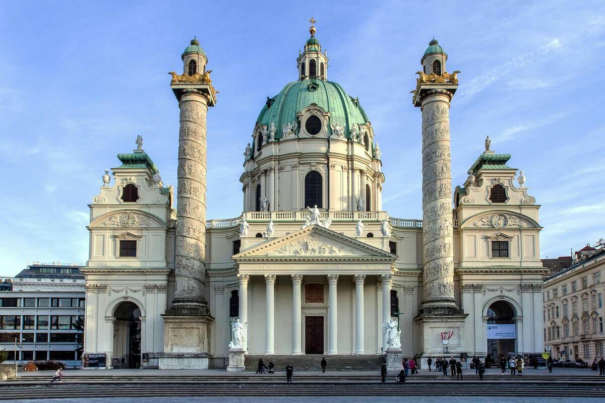 Karlskirche church in Vienna with historic columns and baroque architecture, romantic European city