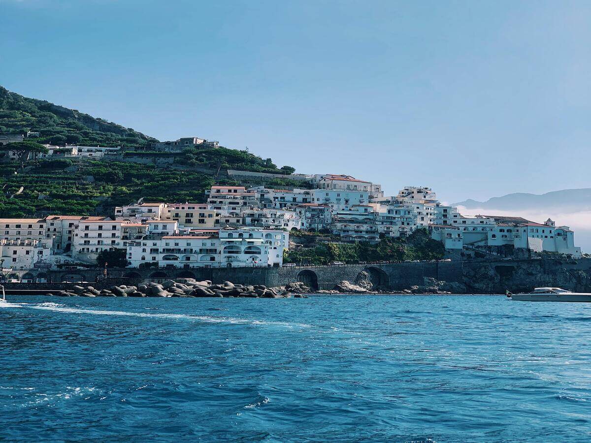 Amalfi Coast village with colourful cliffside houses overlooking the Mediterranean Sea