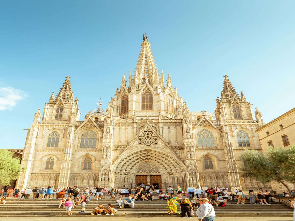 Barcelona Cathedral Gothic facade with tourists gathered in front
